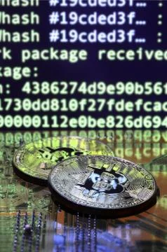 The digital process of cryptocurrency mining by using the GPUs. Bitcoins and  Foto stock