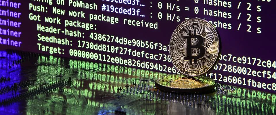 The digital process of cryptocurrency mining by using the GPUs. Bitcoins and  Stockfoto's