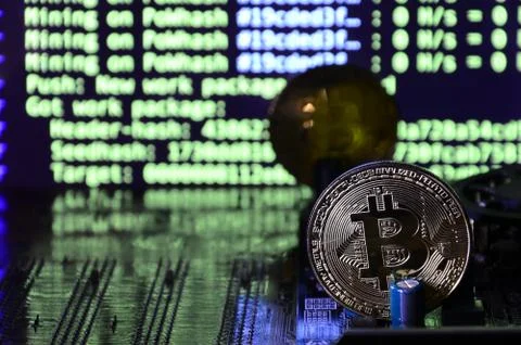 The digital process of cryptocurrency mining by using the GPUs. Bitcoins and  Stock Photos