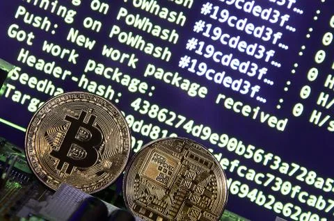 The digital process of cryptocurrency mining by using the GPUs. Bitcoins and  Stockfoto's