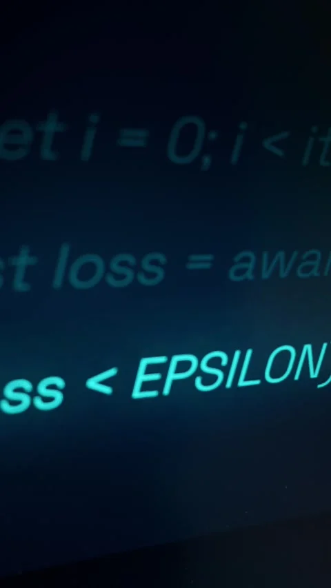 Digital Programming Code Glowing on Screen with Futuristic Teal Aesthetic 動画素材 334728096