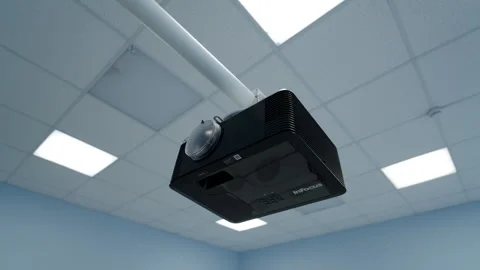 Digital projector hangs securely from ceiling mount Stockbeeldmateriaal 332268901