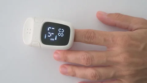 Digital Pulse Oximeter Showing Sudden Drop in Blood Oxygen Level Stock Footage 342278042