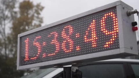 Digital race time board at start line. Footage. LED glow panel with time Vidéo 142916177