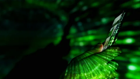 Digital rain on human hand with smartphone. Stock Footage 103716005