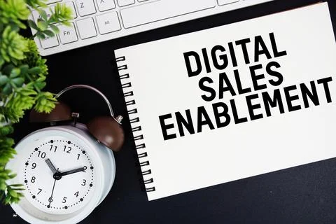 Digital Sales Enablement text written on notepad with keyboard and alarm cl.. Stock Photos