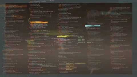 Digital screen displaying scrolling computer programming code with colorful Stock Footage 339962311