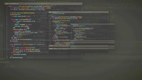 Digital screen displaying scrolling computer code for software development and Stock Footage 339972008
