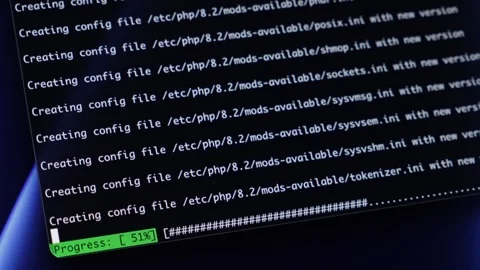 Digital screen shows system installation, 'Creating config file' updates, a.. Stock Footage 320174345