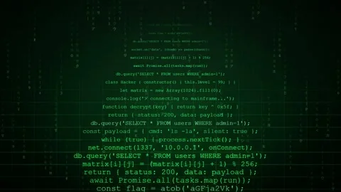 Digital scrolling computer code on dark screen representing cybersecurity and Stock Footage 345766207