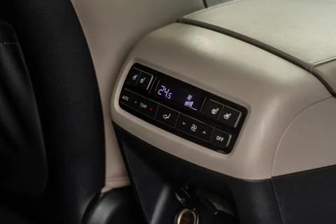 Digital second row seat temperature control of a modern car. Car air conditio Stock Photos