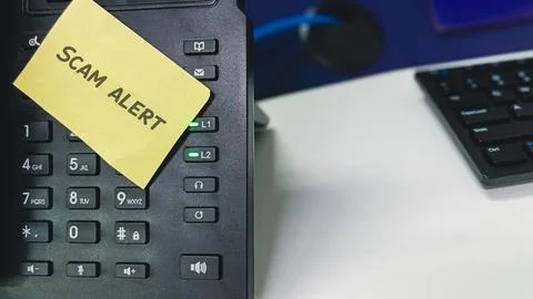 Digital Shield: "SCAM ALERT" on Your Phone Keypad Stock Photos