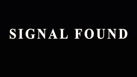 Digital signal found text animation with glitch effect on black background 스톡 동영상 343479876