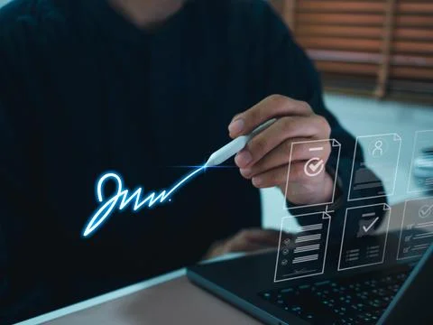 Digital signature on virtual interface with hand using stylus pen. E signat.. 写真素材
