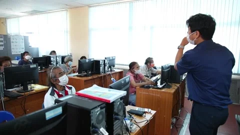 Digital skills, vocational training programs for elderly to support Thailand's a Stock Footage 242162620