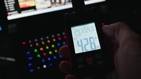 Digital Sound Level Meter Measuring Room Noise Near Laptop Computer Stock Footage 338101387