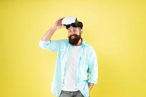 Digital space. Entertainment. Testing software. Bearded man yellow background vr Foto stock