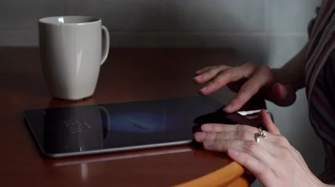 Digital tablet and coffee Stock Footage 64182938