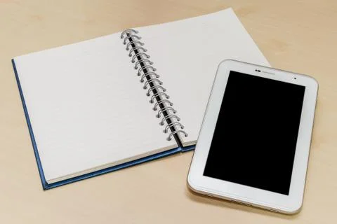Digital tablet and notepad Stock Photos