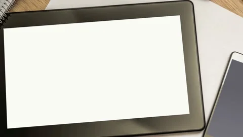 Digital tablet on business table with blank white screen and mobile phone Stock Footage 168885400