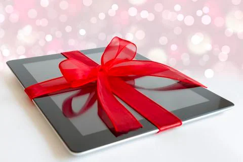 Digital tablet with christmas present 스톡 사진