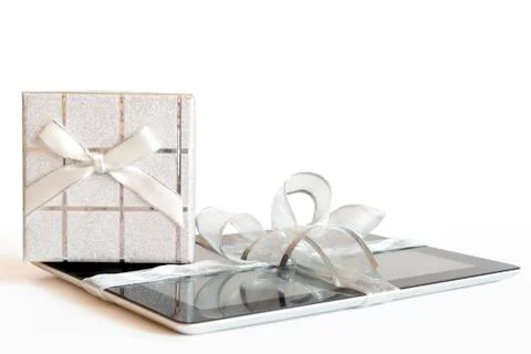 Digital tablet with christmas present Stock Photos