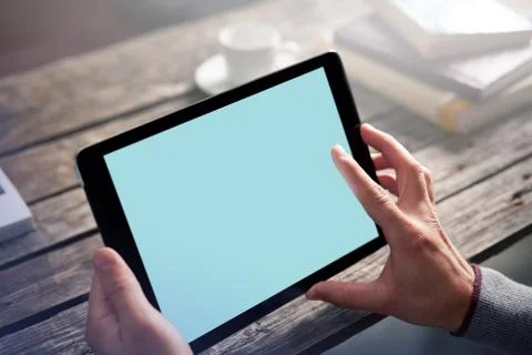 Digital tablet computer in male hands 写真素材