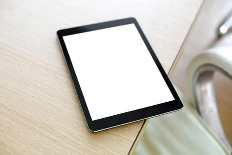 Digital tablet computer on office desk 写真素材