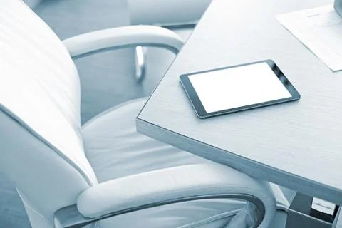 Digital tablet computer on office desk 写真素材