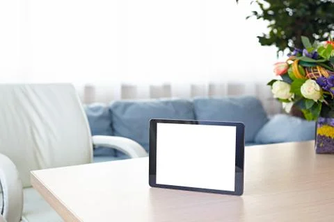 Digital tablet computer on office desk Stock Photos