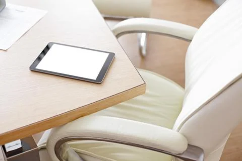 Digital tablet computer on office desk Stock Photos