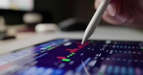 Digital tablet computer show the financial data with digital pencil Stock-Footage 218611347