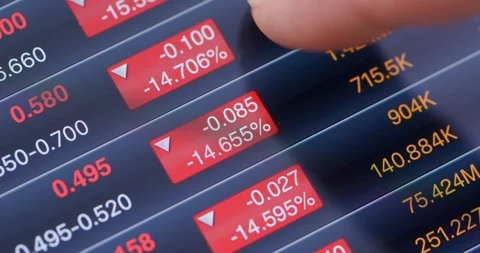 Digital tablet computer showing stock market data Stockbeeldmateriaal 94033772