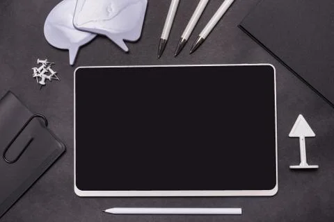 Digital tablet on desk, top view Stock Photos