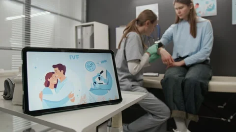 Digital Tablet Displaying IVF Illustration, Doctor Examining Patients Skin Stock Footage 333689934