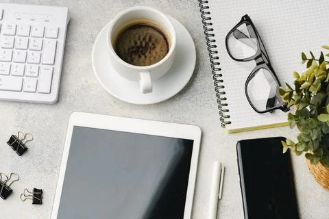 Digital tablet with empty screen on table with business accessories Stock Photos