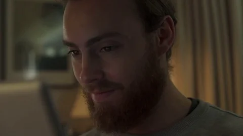 Digital Tablet Glowing on Face Stock Footage 80001468