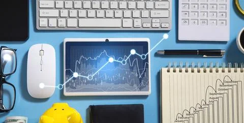 Digital tablet with a growth graph in screen. Stock Photos