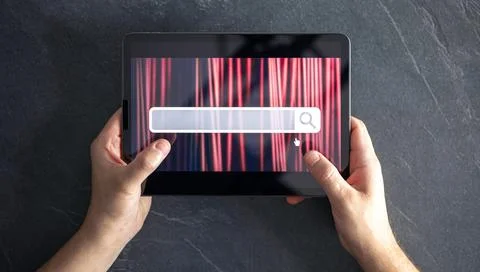 Digital tablet with internet browser search bar on screen in male hands. Stock Photos