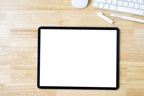 Digital tablet mockup on office working table Stock Photos