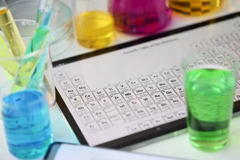 Digital tablet with periodic system of elements lying on table in laboratory 스톡 사진