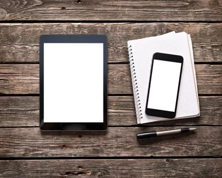 Digital tablet with phablet and notepad Stock Photos
