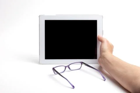 Digital Tablet with reading glasses Foto stock