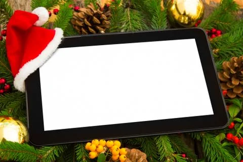 Digital tablet with santa hat Stock Photos