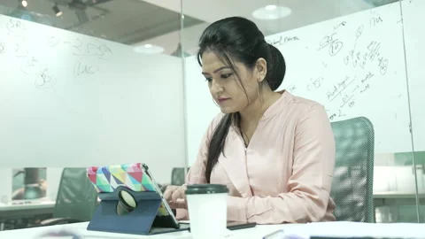 Digital Tablet use by Beautiful Young Asian Woman in home Office. Video stock 168282171