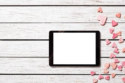 Digital tablet on white wood table Stock Photos