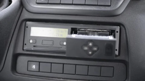 Digital tachograph with open printer and visible roll of paper inside the car Video stock 167436807