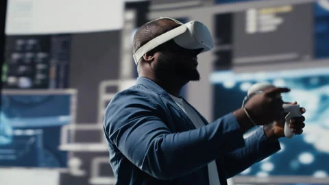 Digital tech expert coding and using VR headset at innovation hub Video stock 312304622