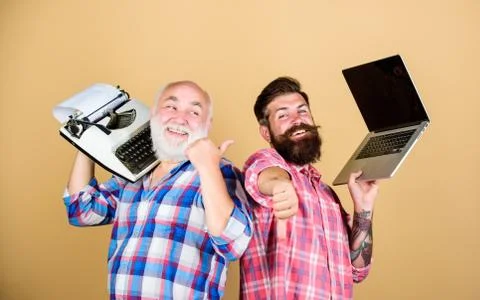 Digital technologies. Battle of technologies. Old generation. Men work writing 스톡 사진