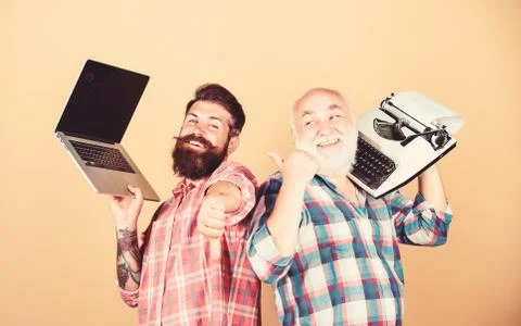 Digital technologies. Battle of technologies. Old generation. Men work writing 스톡 사진